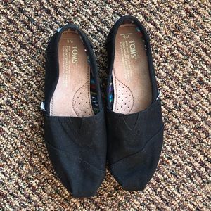 TOMS black slip on shoes size 6